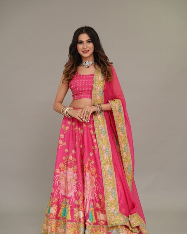 Studio portrait of a model wearing a blush pink occasion outfit