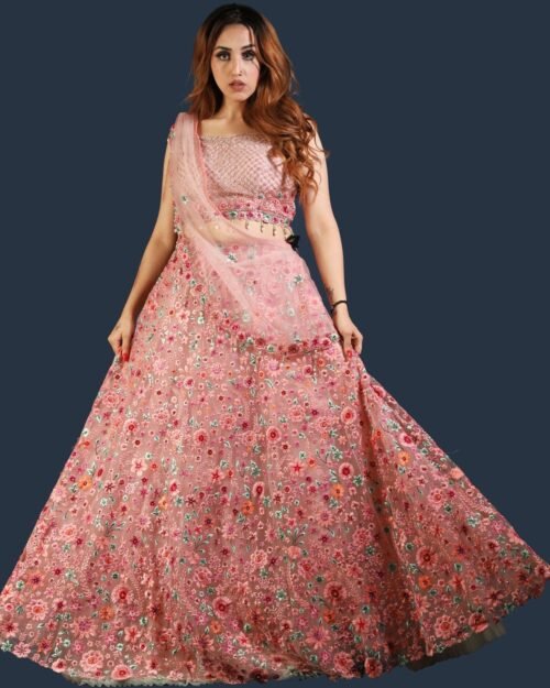 Studio portrait of a model wearing an ornate occasion outfit